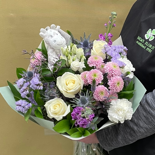 Lavish lilacs hand tied bouquet with toy