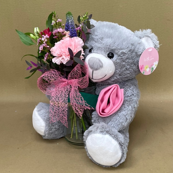 Summer garden bear with flowers