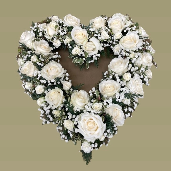 White rose and gypsophilia open heart