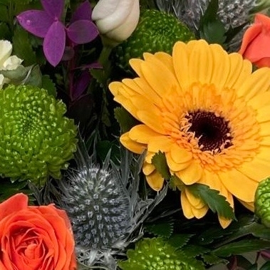 Bright funeral posy