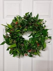Festive holly wreath