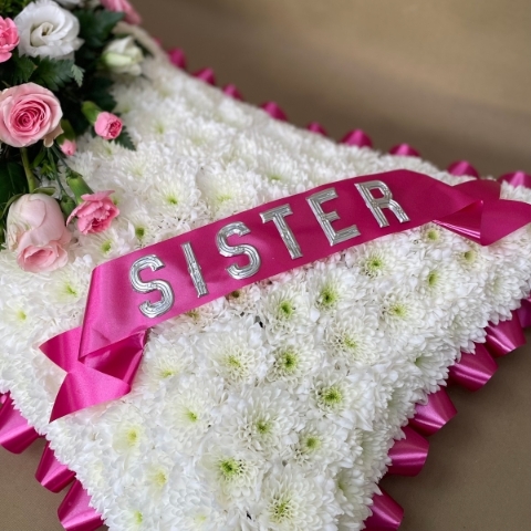 Pillow based with silver letters