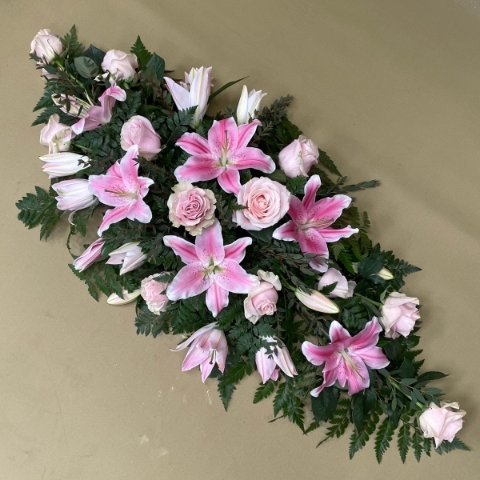 Rose with lilies casket spray