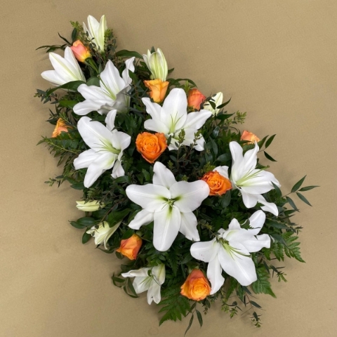 Vibrant rose and lily spray