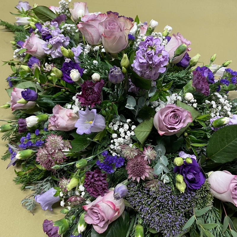 Essence of violets casket spray