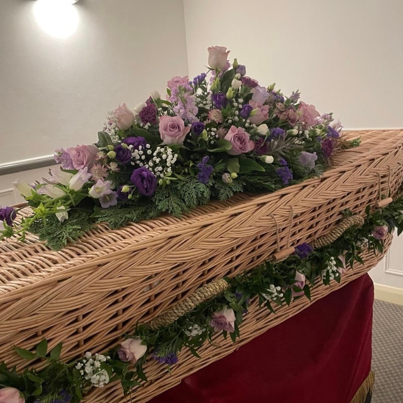 Essence of violets casket spray