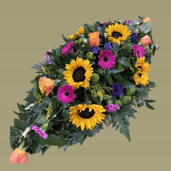 Bright medley Casket spray