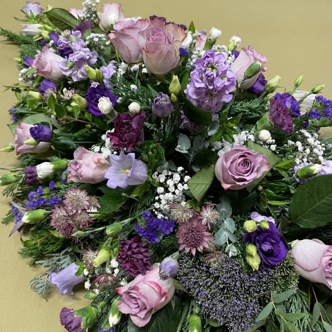 Essence of violets casket spray